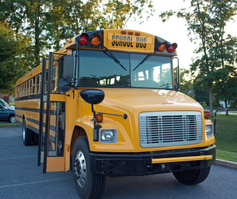 Police seek hit-and-run driver who crashed into school bus carrying kids